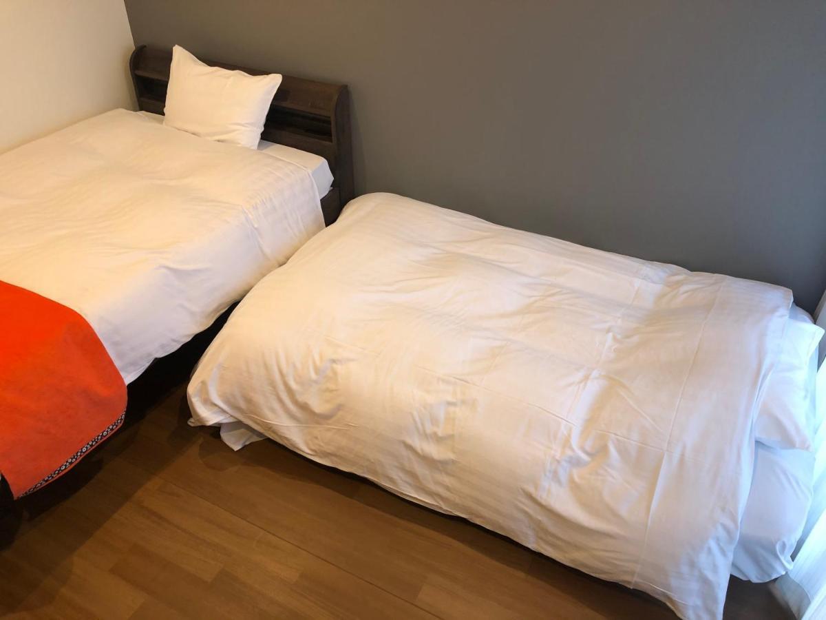 Apartment Hotel Ecott Kagoshima Bagian luar foto