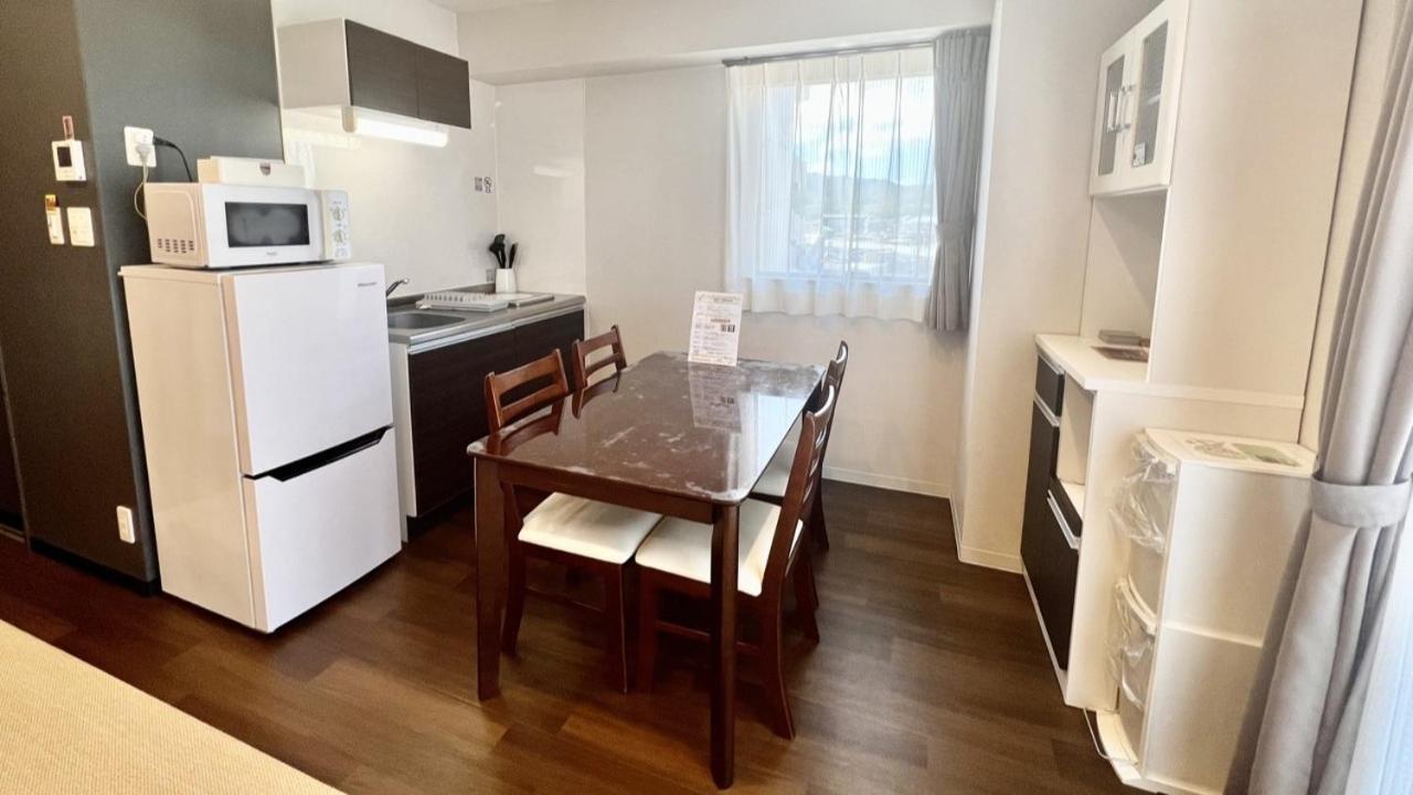 Apartment Hotel Ecott Kagoshima Bagian luar foto